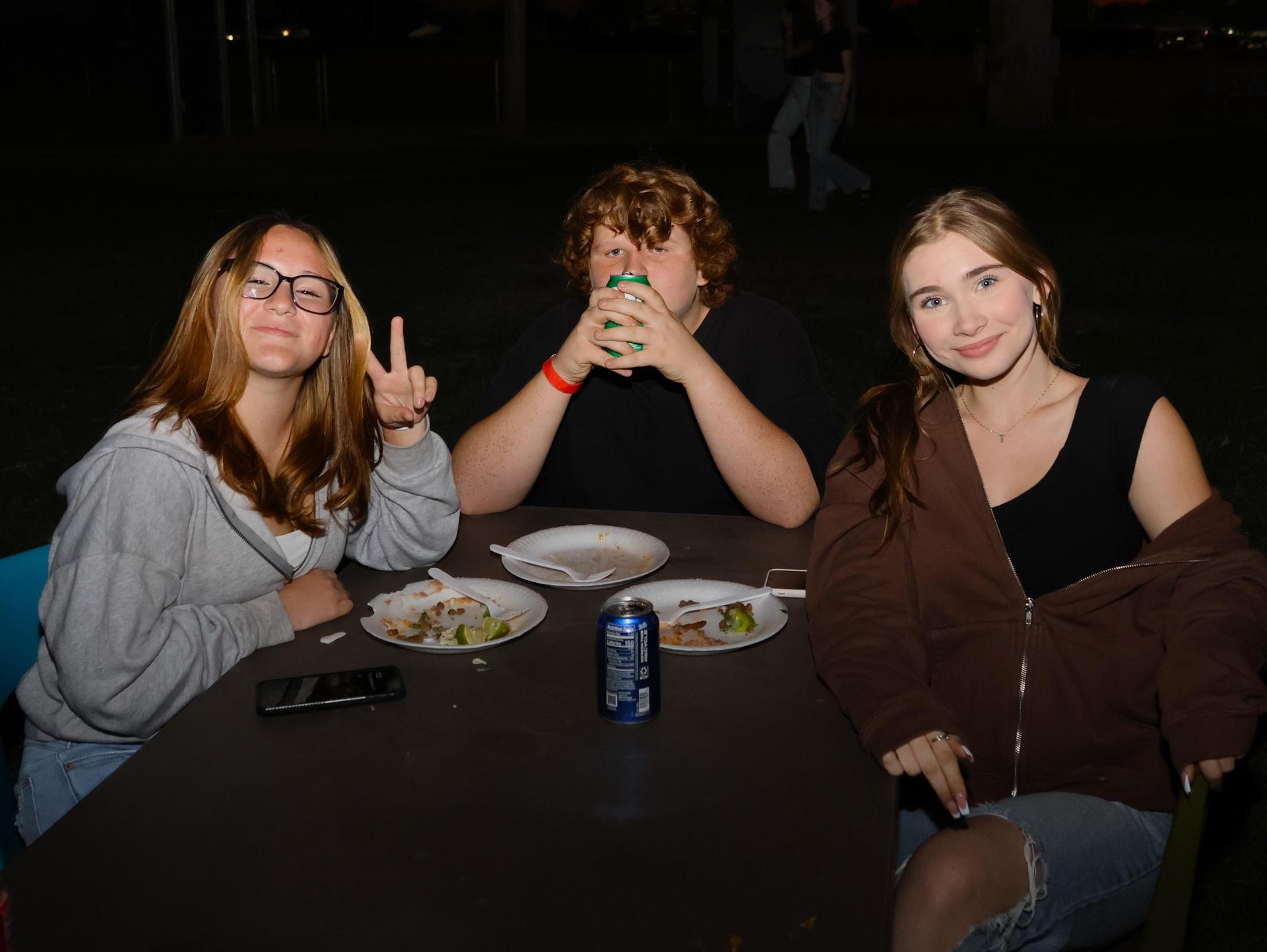 students and staff enjoying the tailgate