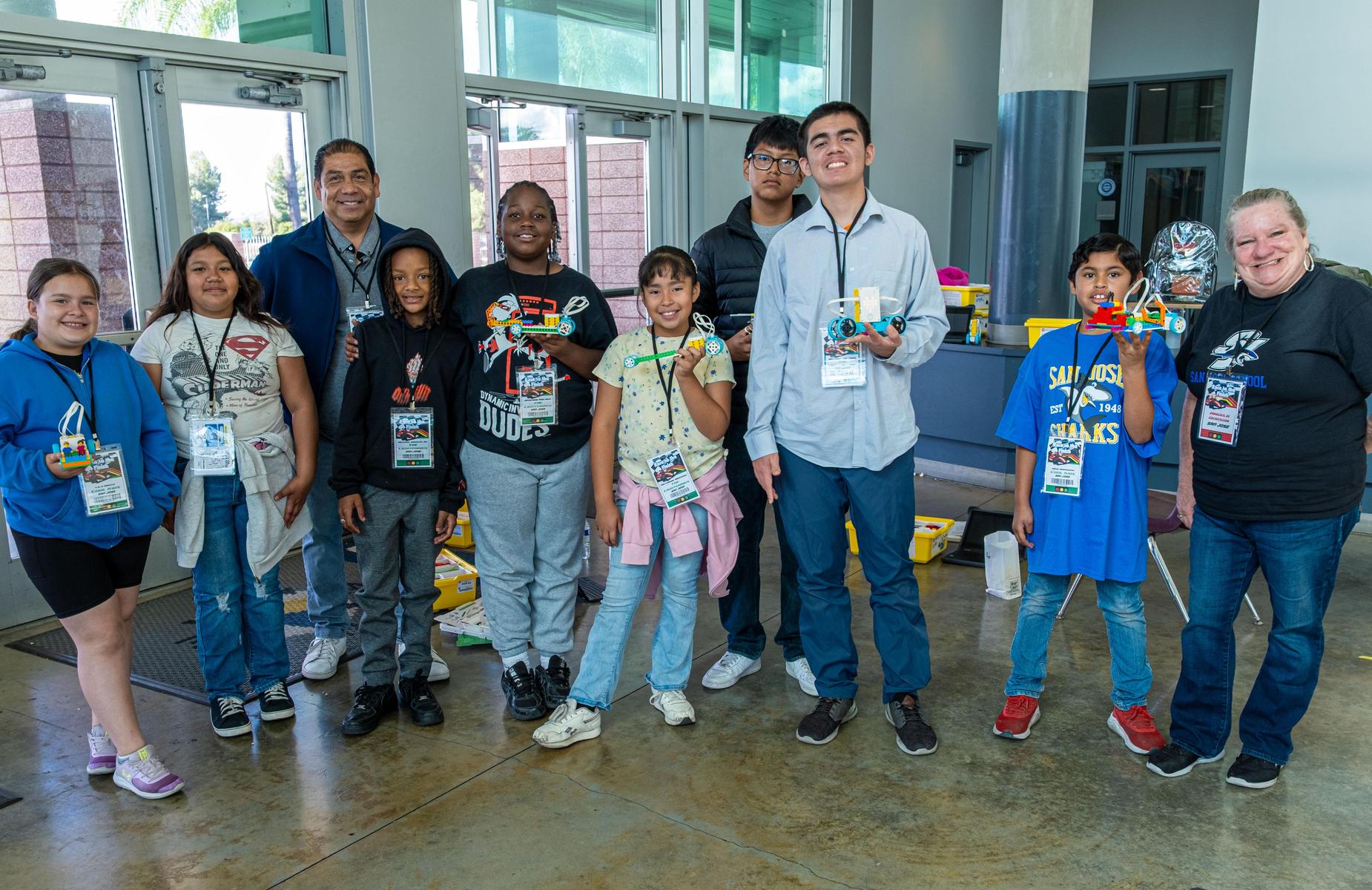 students pose with their teachers from San Jose