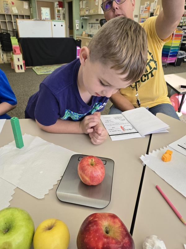 Students help find the prized apple