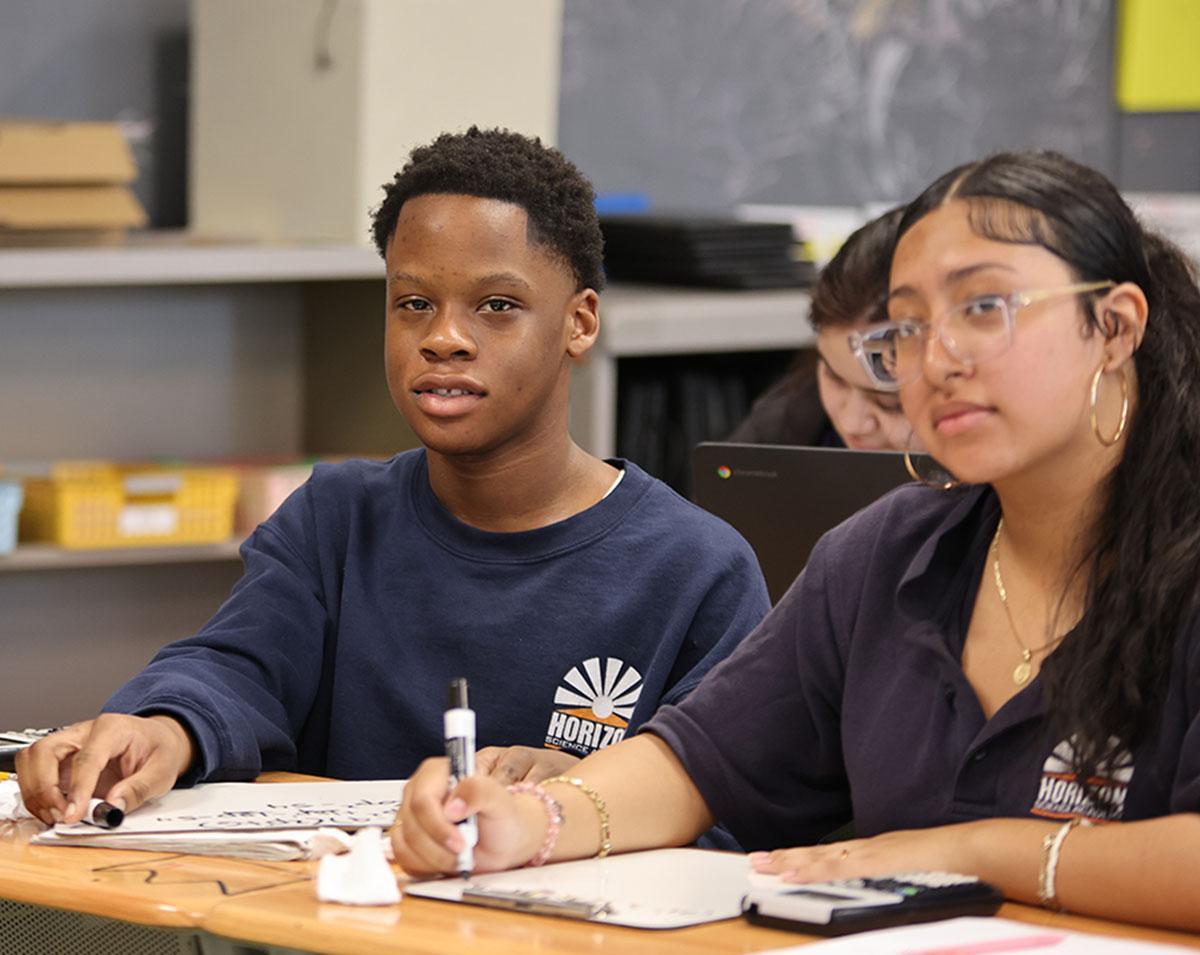 HSA Belmont student smiling in class