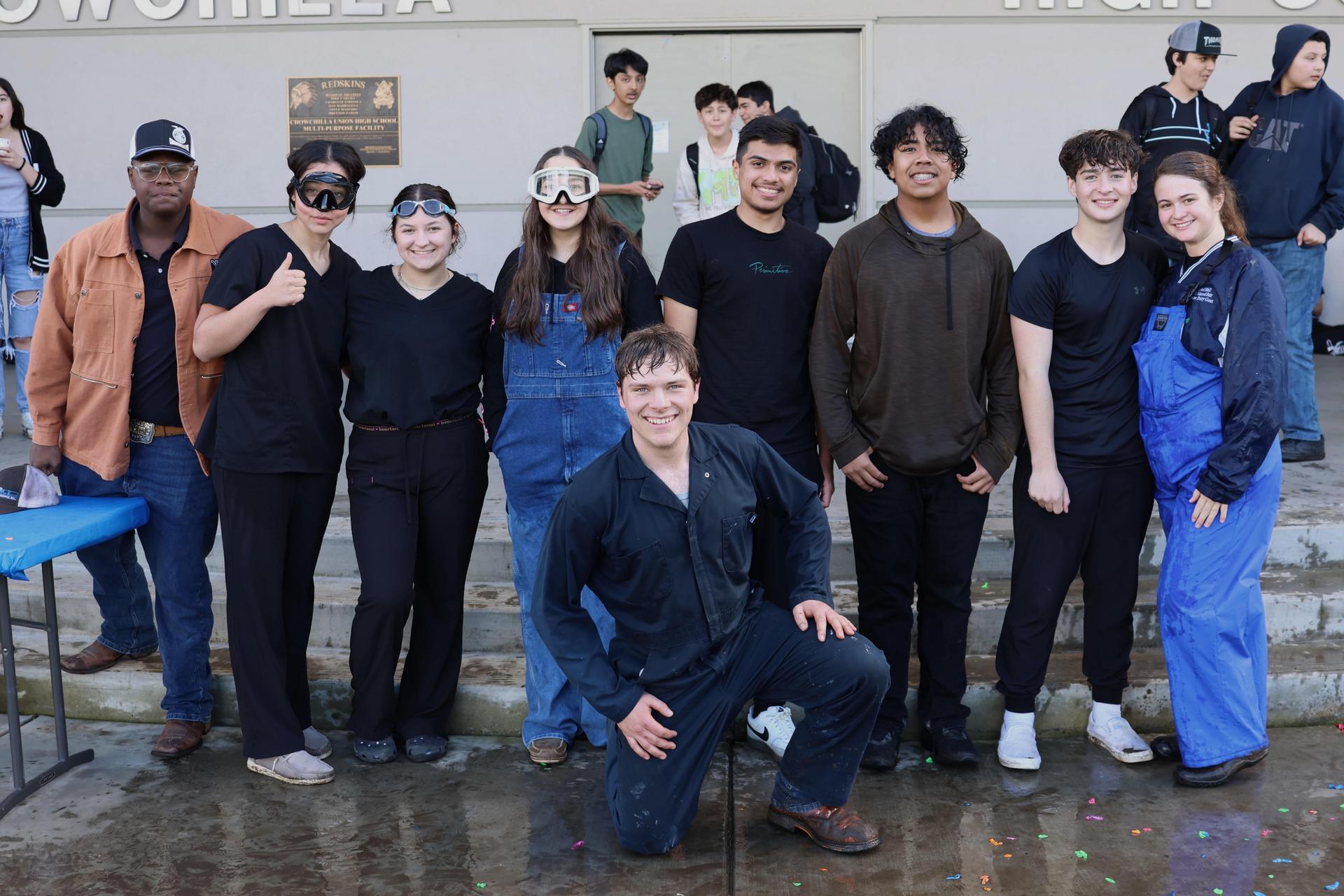 students and staff enjoying the water balloon toss
