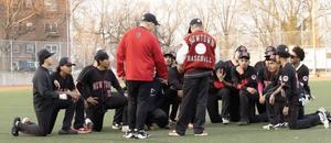 the baseball people on the green floor