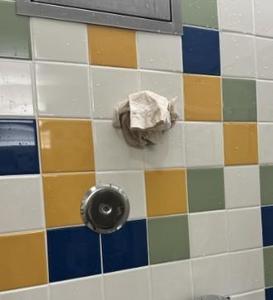 wet paper towels on wall