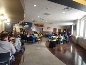 Luncheon area filled with FFA members and 4th graders for lunch.