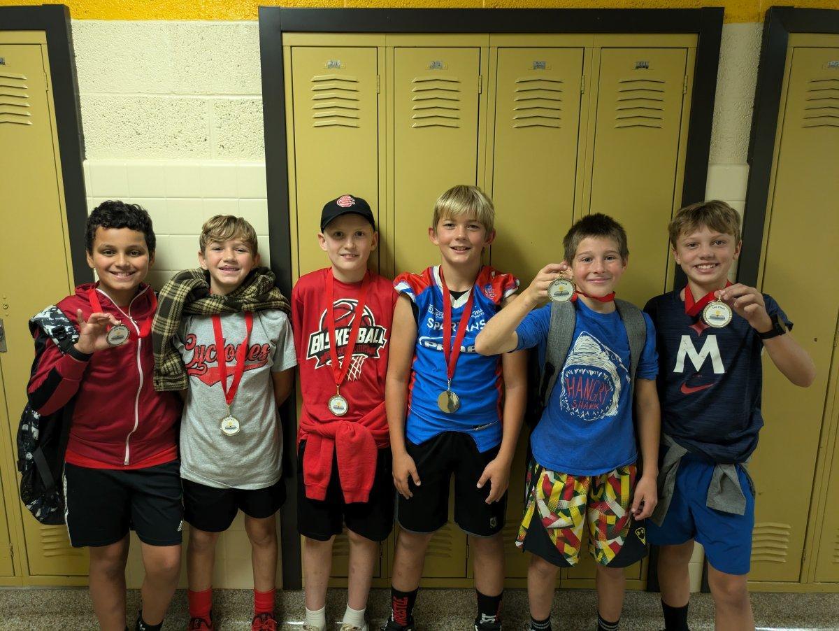 students standing in hallway
