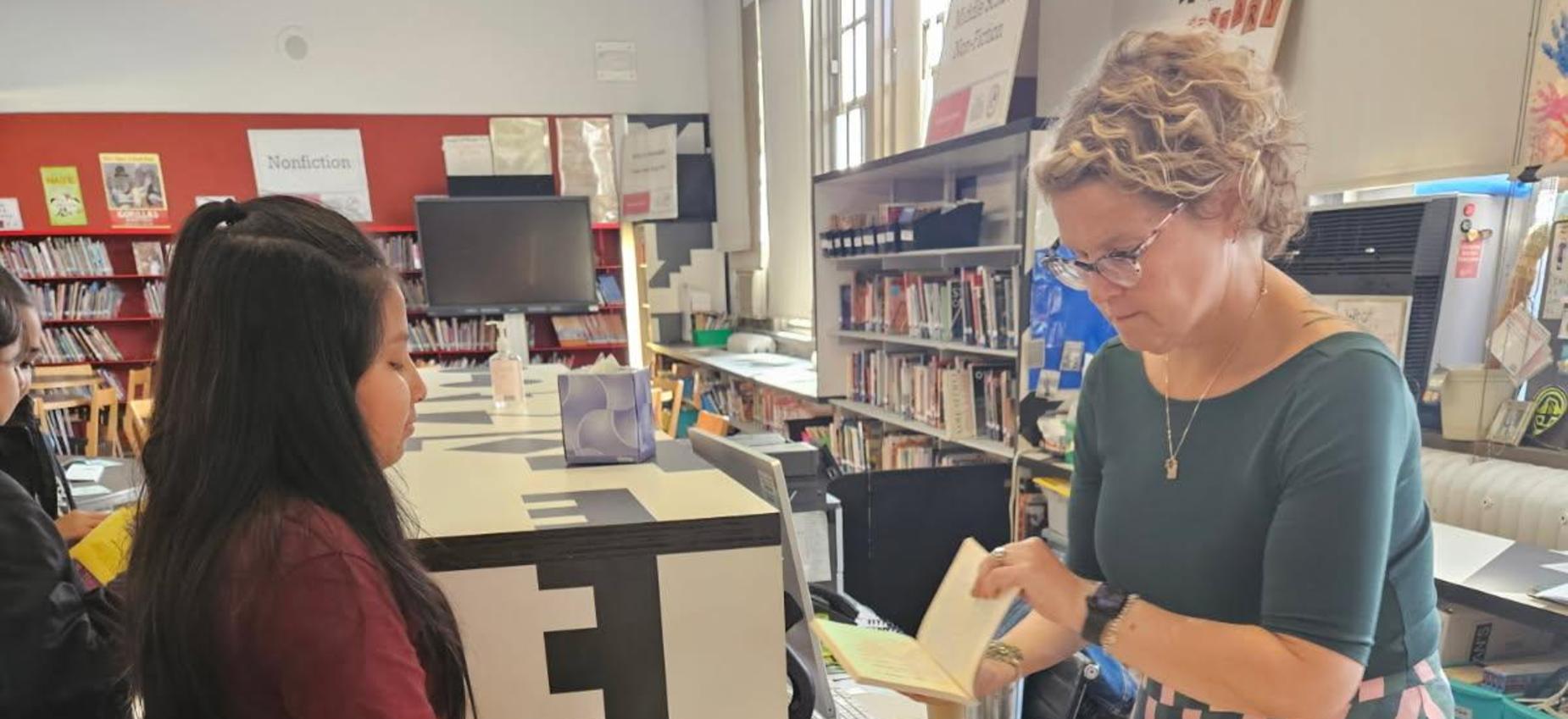 Ms Jeffcoat helping students