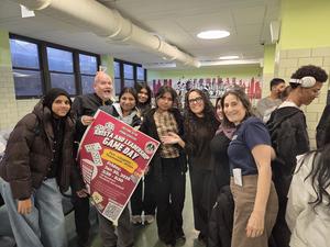 a group photo of arista game day