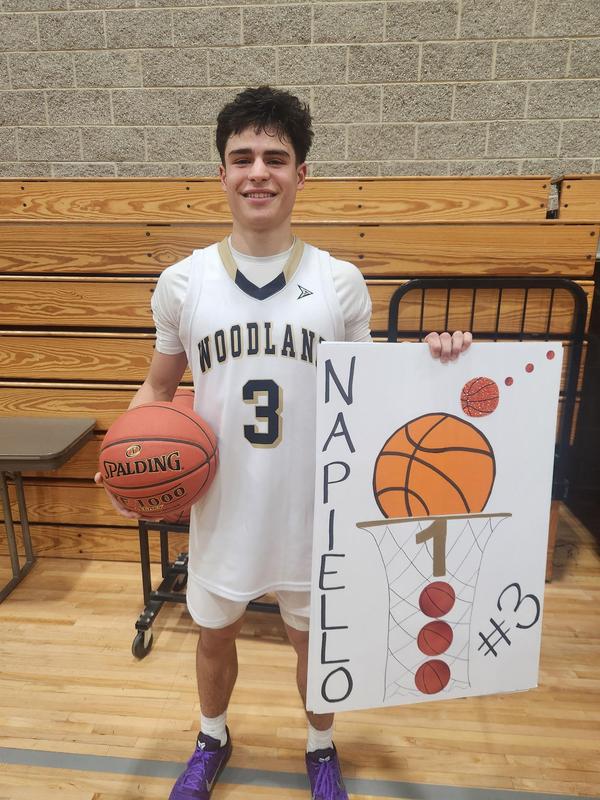 high school student scores 1000th point in basketball