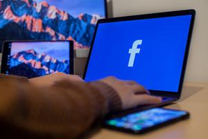 Laptop open to Facebook