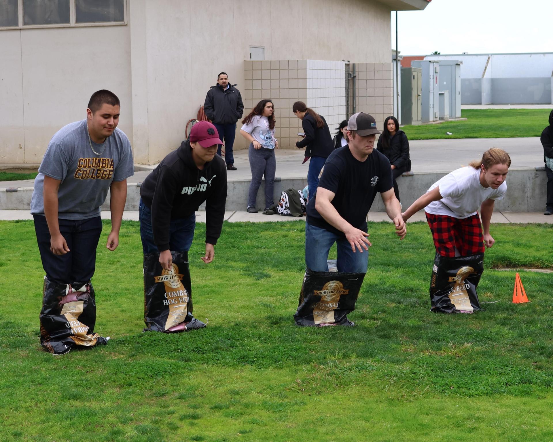 students and staff enjoying the feed bag relay