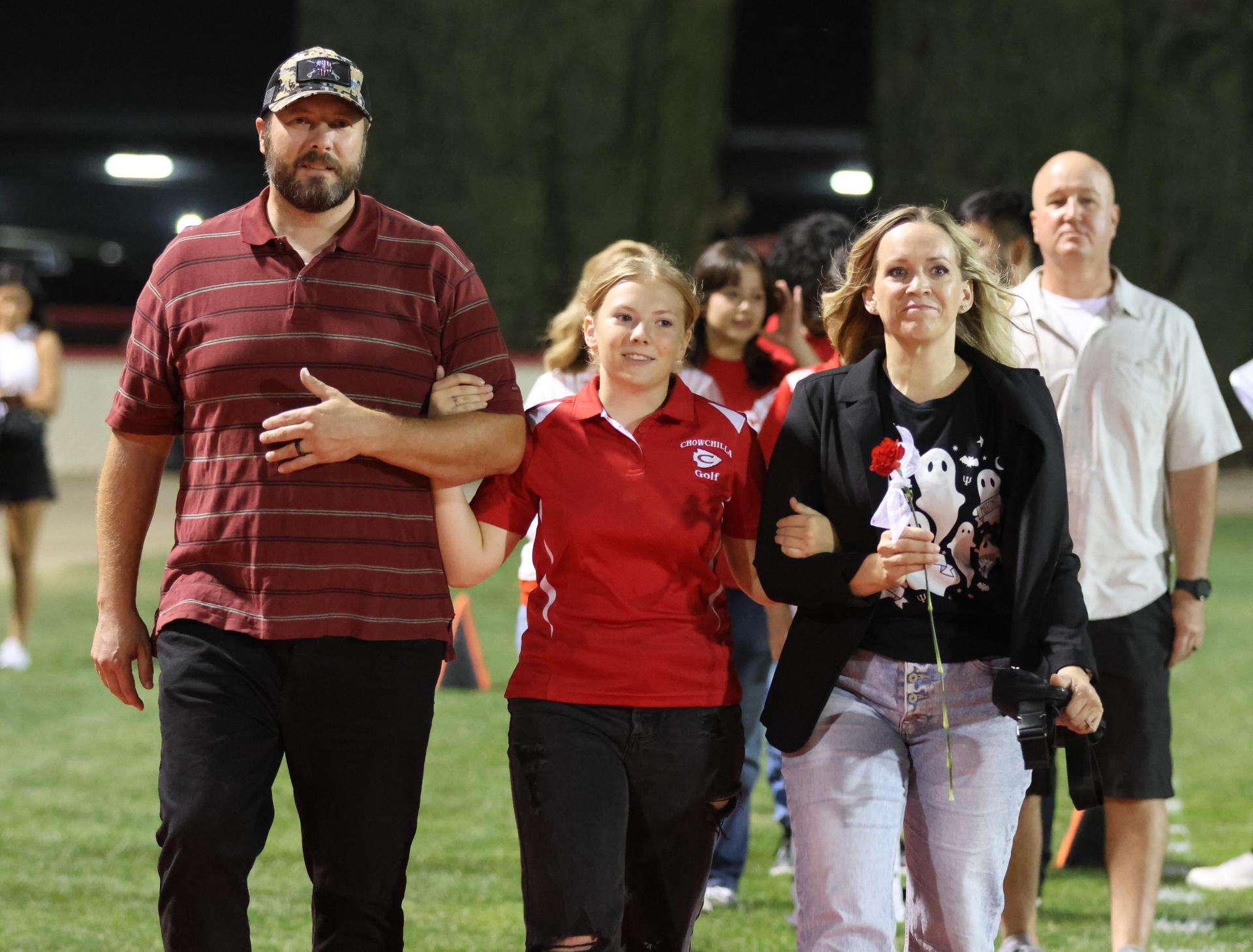 seniors and their escorts celebrating senior night