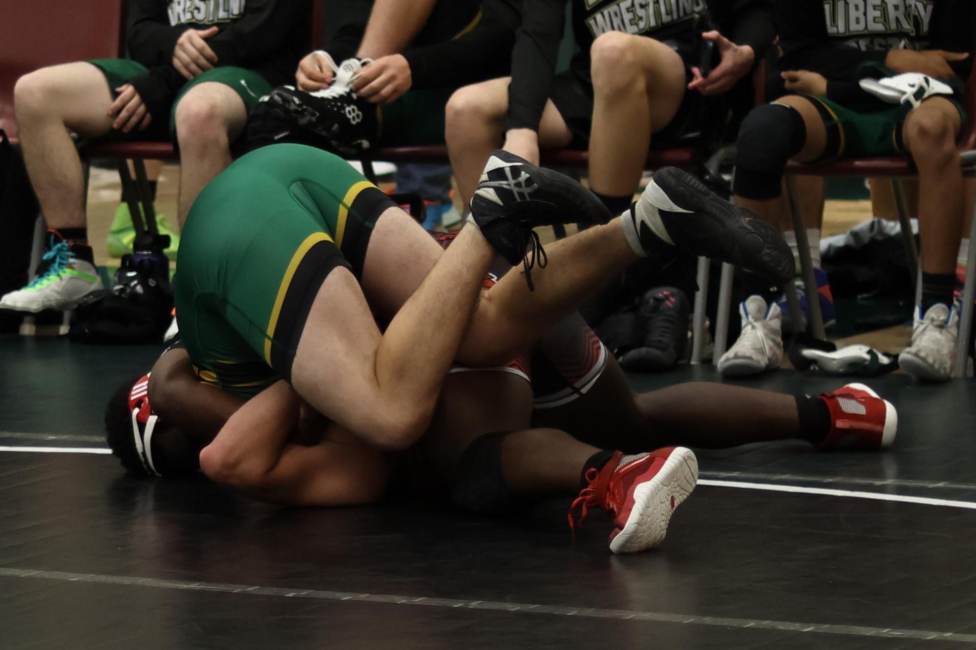 boys wrestling at liberty duals