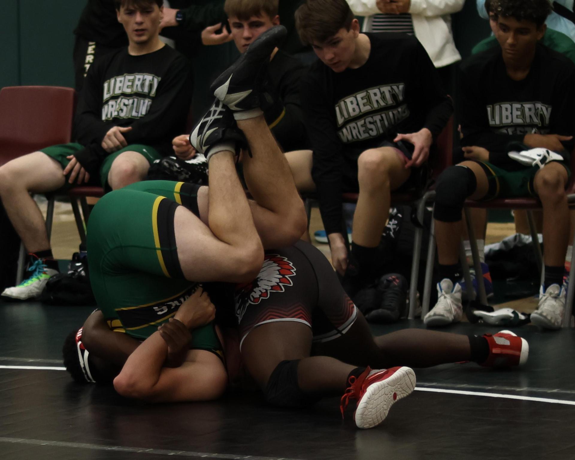 boys wrestling at liberty duals