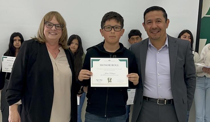 FMS Student receiving an award