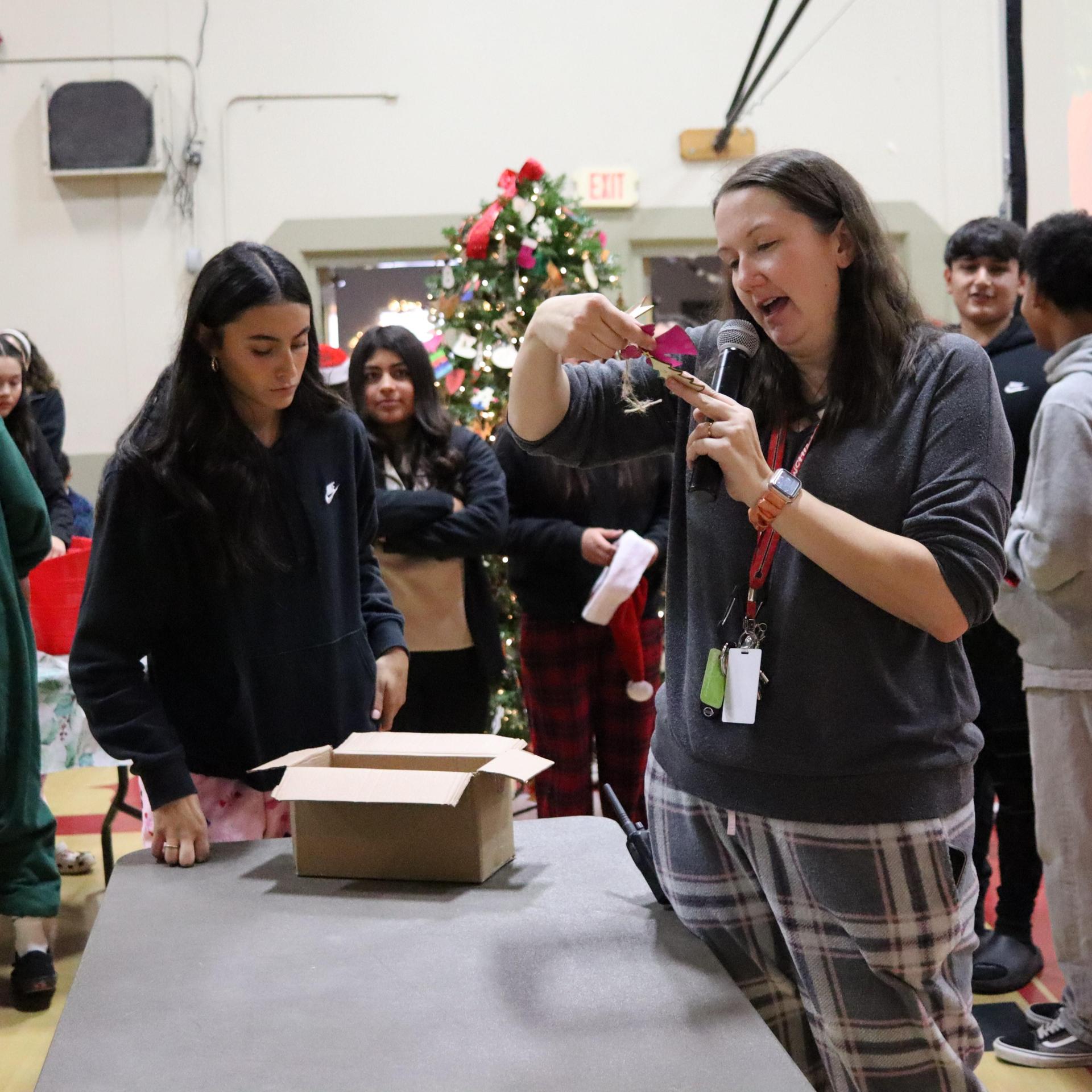 students receiving gifts