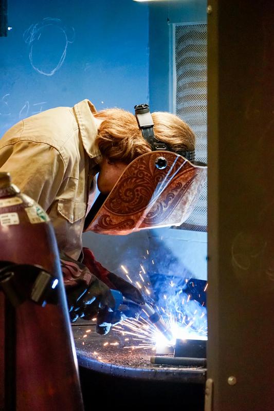 FHS Ag Mech student wielding a project