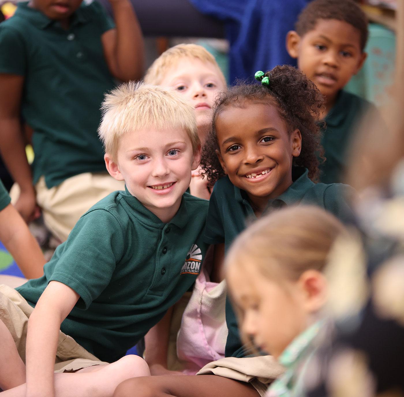 HSA St. Paul student drawing at a desk in a classroom setting