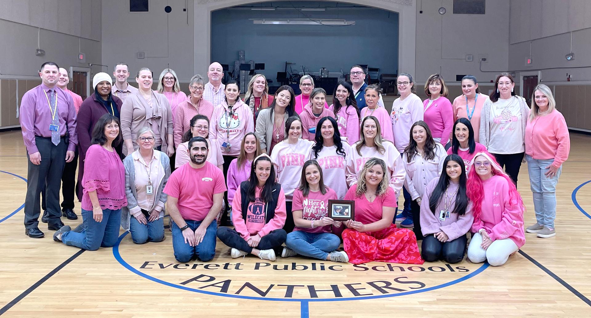 Group photo of Everett Public Schools staff wearing pink for a cause.