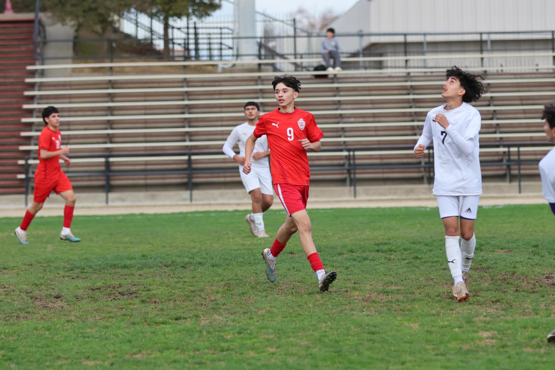 junior varsity boys playing soccer against washington union
