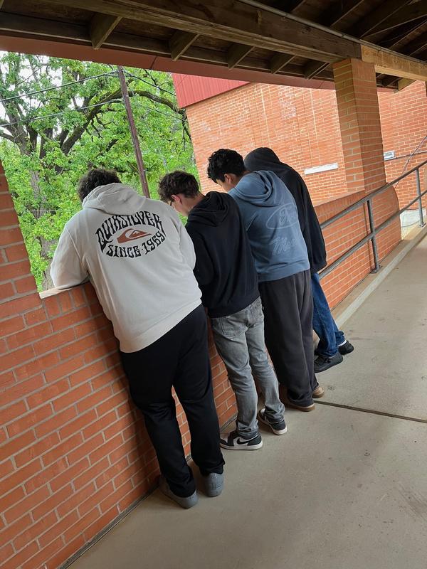 Students working hard to solve the puzzle.