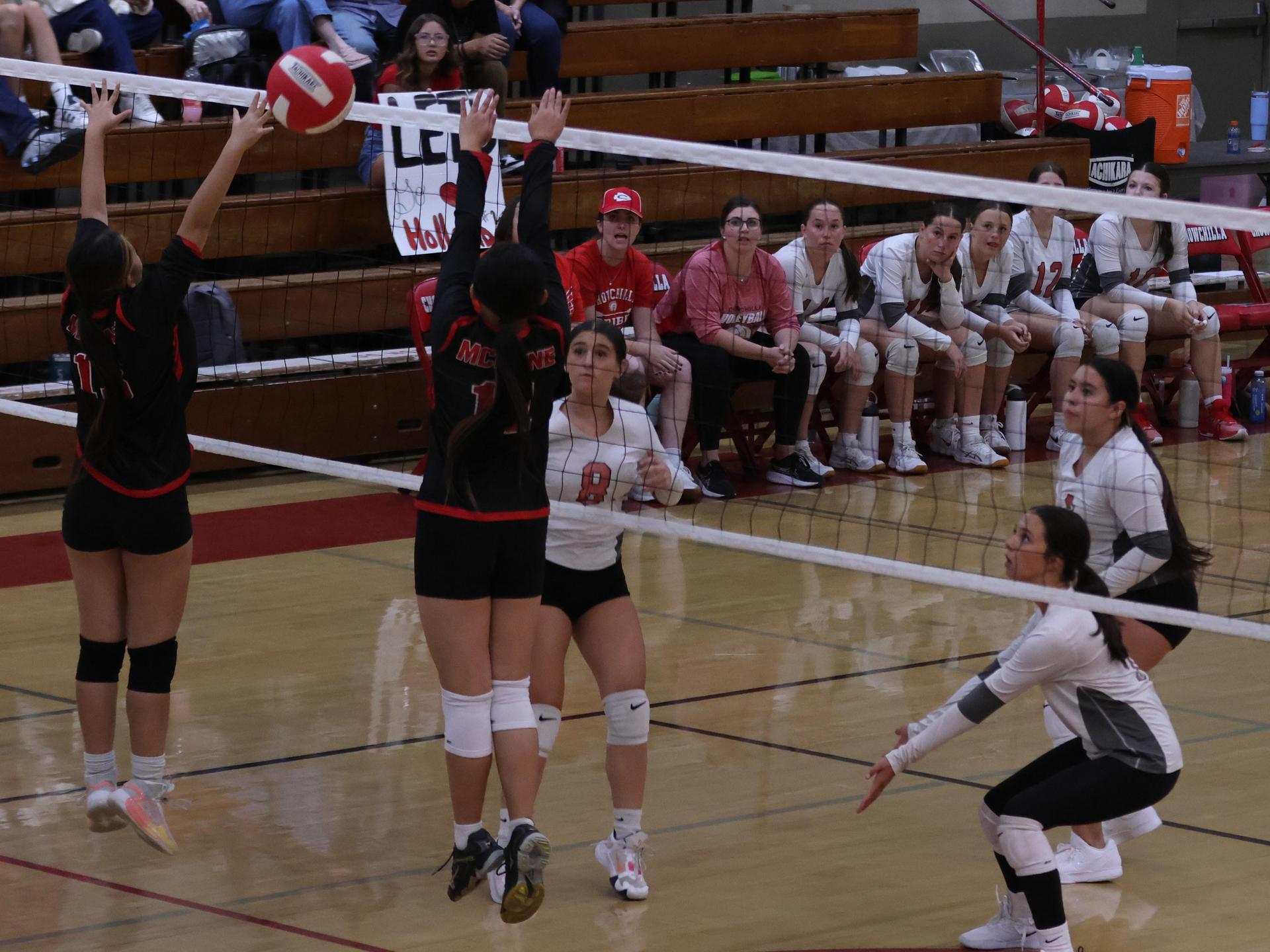 junior varsity girls playing volleyball 64