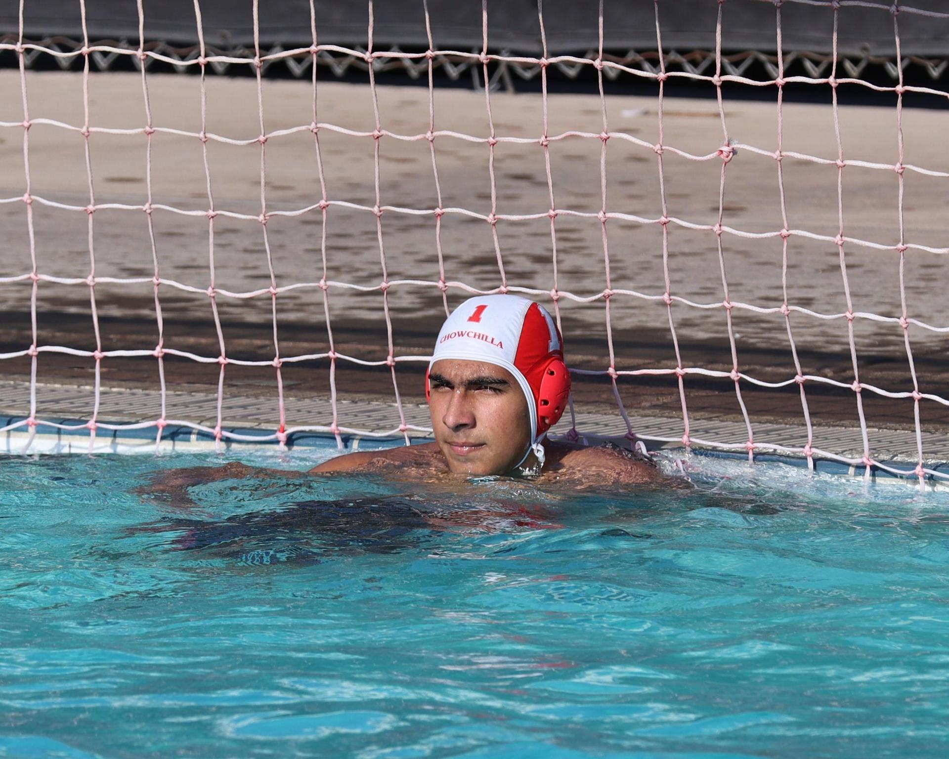 Boys playing water polo against Yosemite