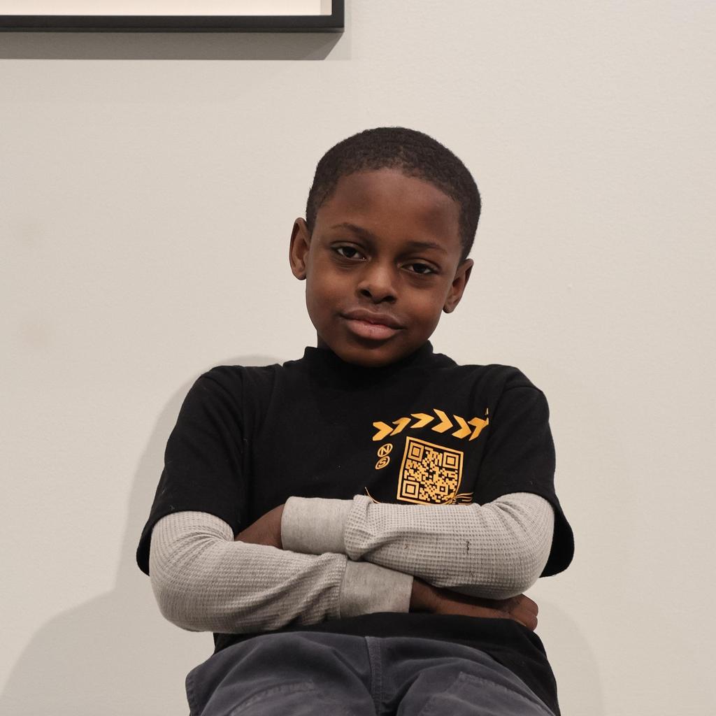 Student sitting with arms crossed