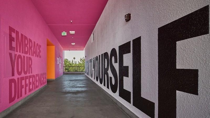 mural that says "embrace your difference"