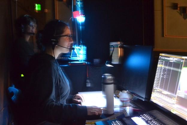 Brooke Carmody '25 stage managing a show