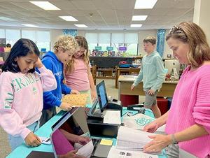 Checking out at the James River Day School Book Fair.