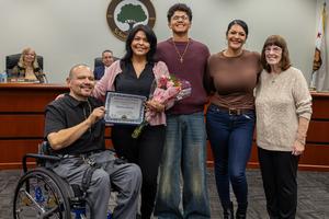 February 2026 Classified Employee of the Month, Minerva Barrios, from Walt Disney Elementary during recognition