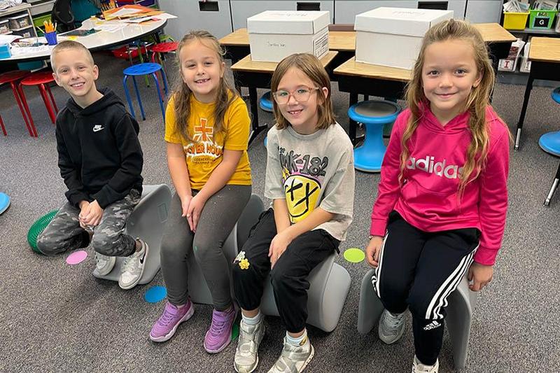 Second-graders Bradley Whitney, Mia Minor, Gwyn Martin, and Amity Koontz try out the new flexible seating