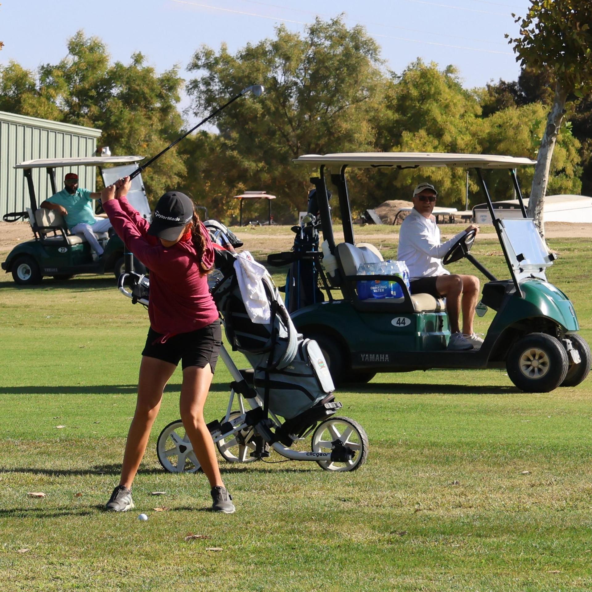 Girls golfers in action at the championships