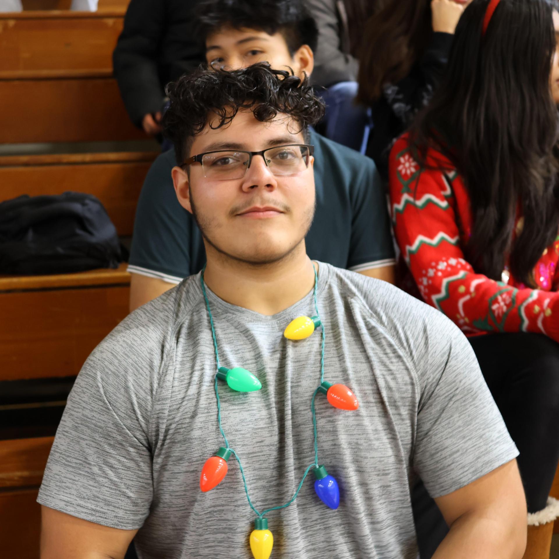 students and staff posing at the winter wishes rally