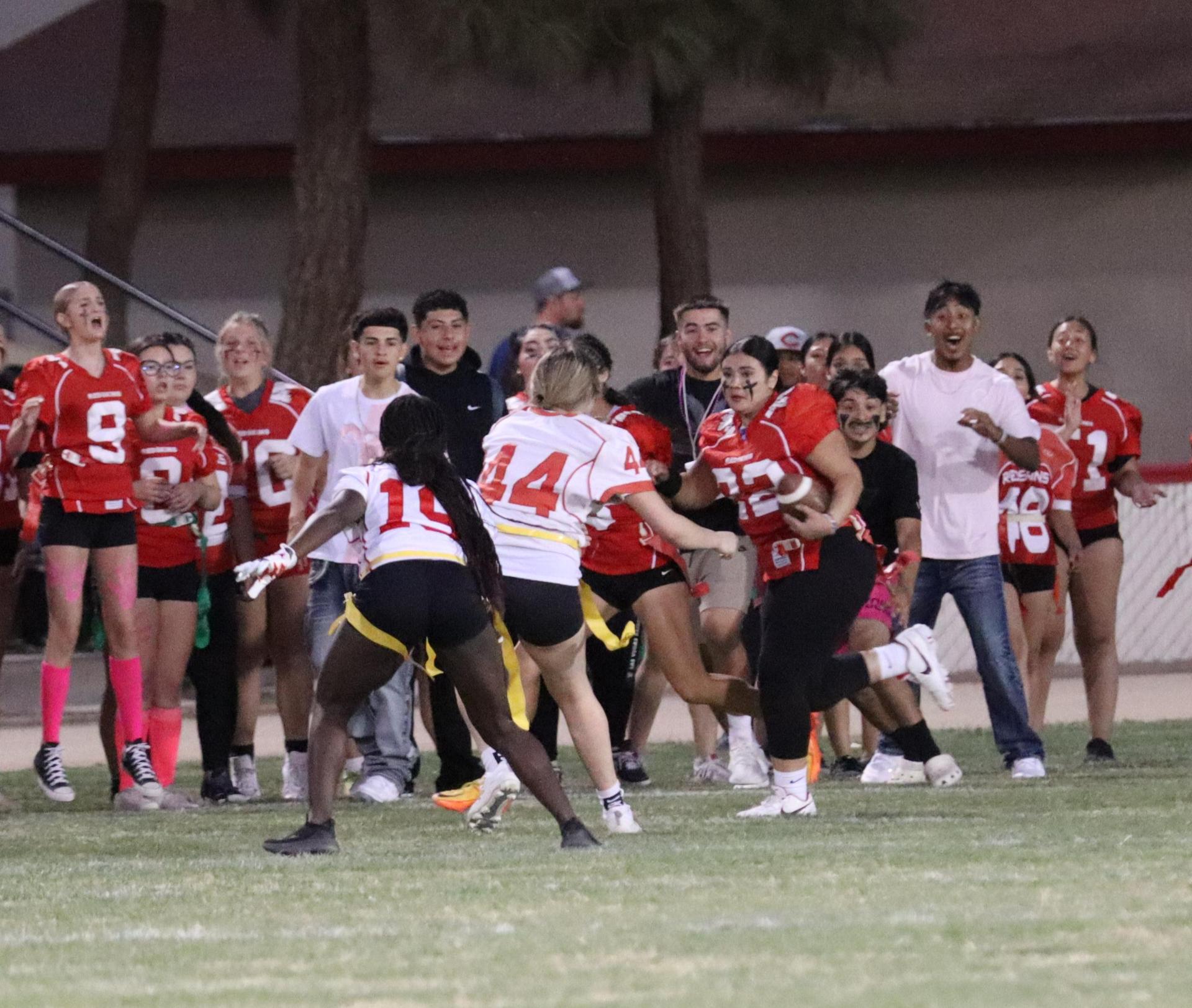 girls playing flag football
