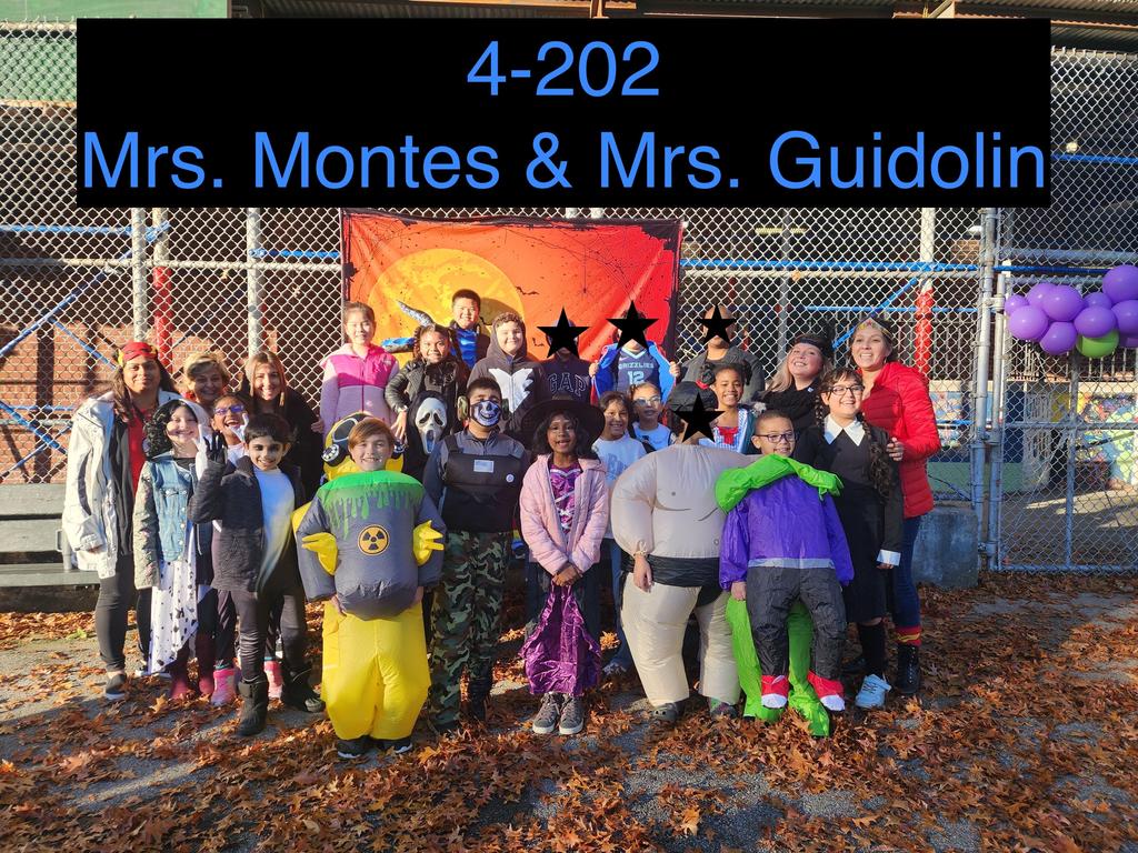 staff and students in halloween costumes