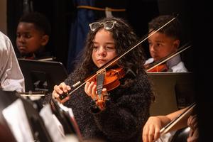 Members of the orchestra perform