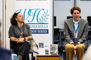 Joy Priest and Kevin McGuire talk during the event