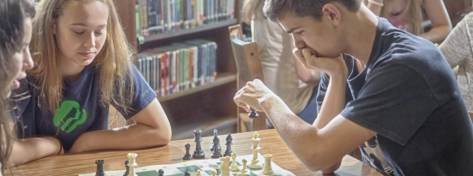 Students playing chess