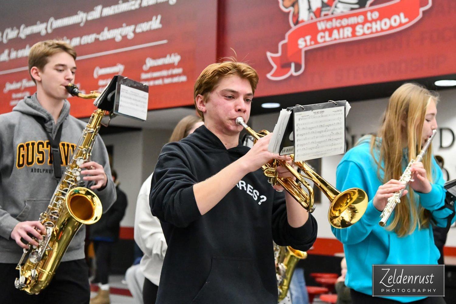 student playing trumpet