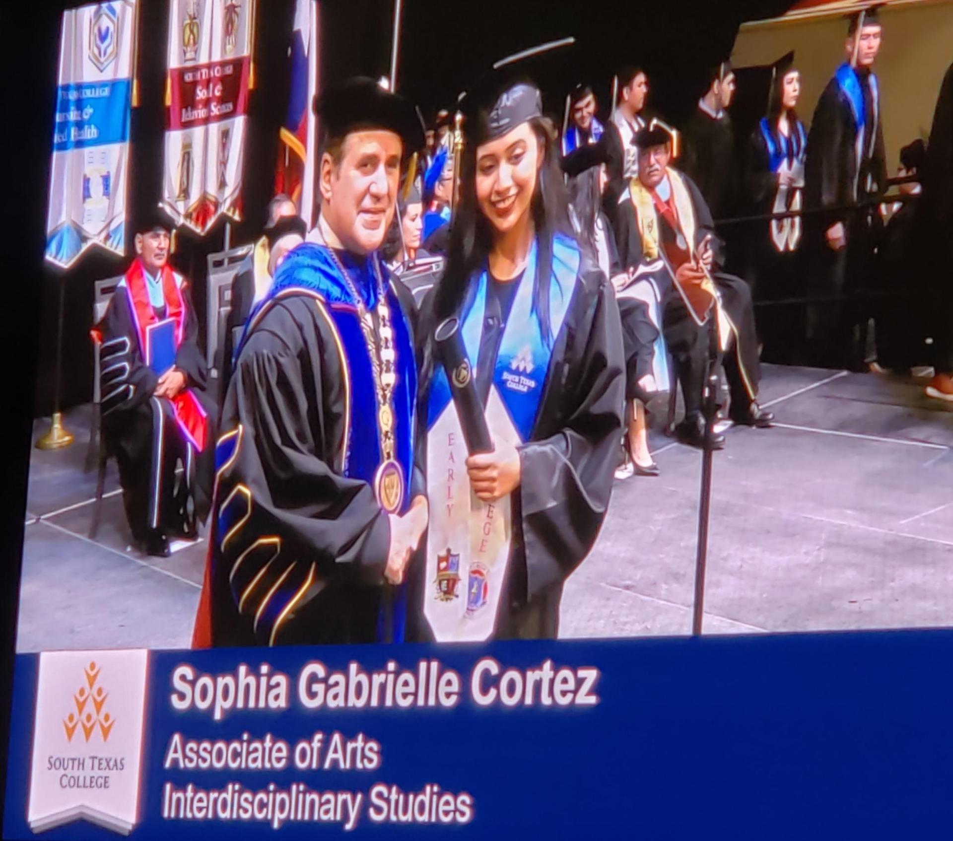 Receiving diploma