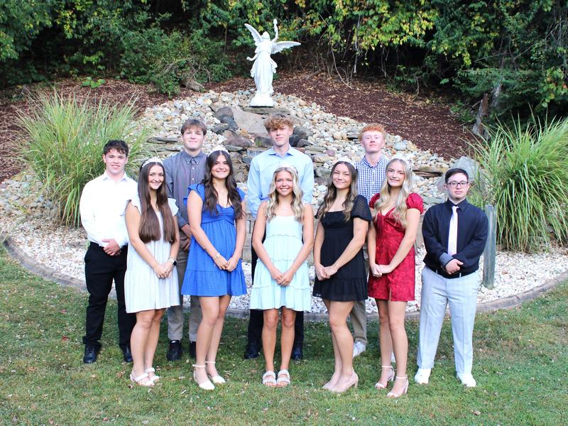 2025 Serra Catholic Homecoming Court in front of the fountain
