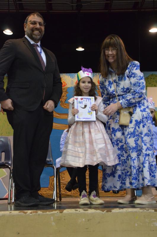 The girls receive their chumashim