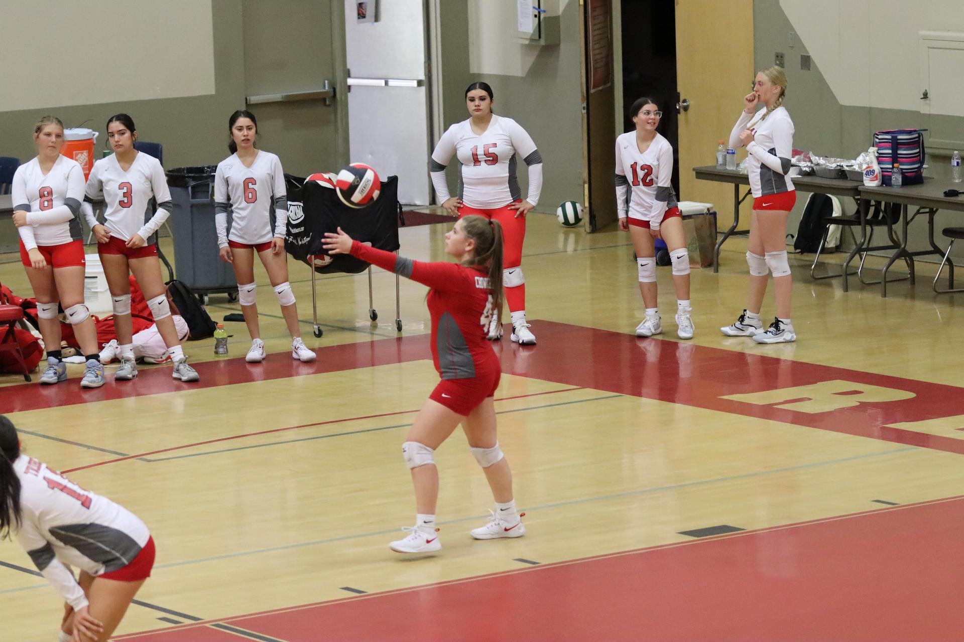 junior varsity girls playing volleyball against Liberty