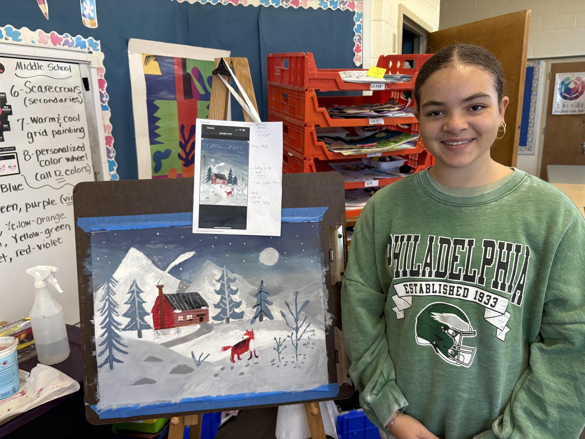 Student with her artwork