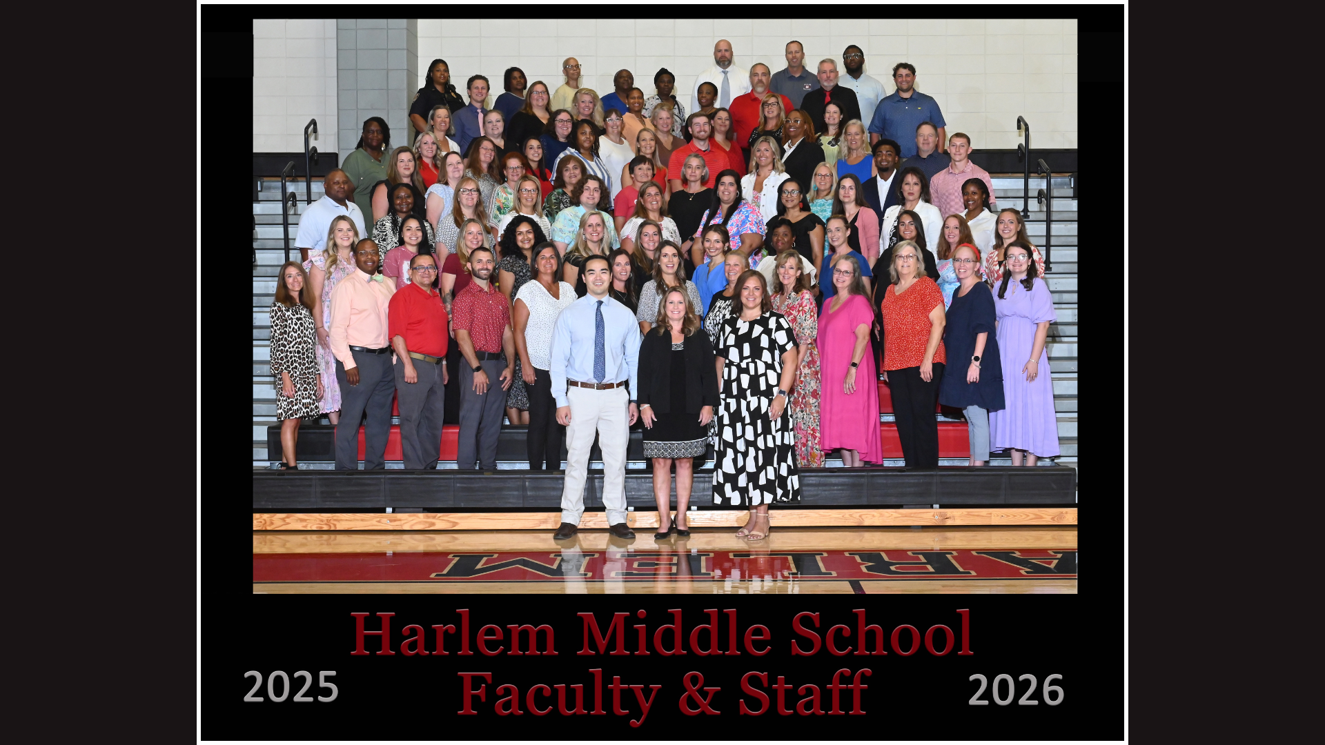Harlem Middle School faculty and staff posing together for group photo.