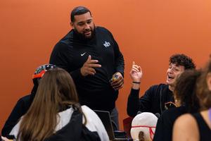 Jullian Turner jokes with students