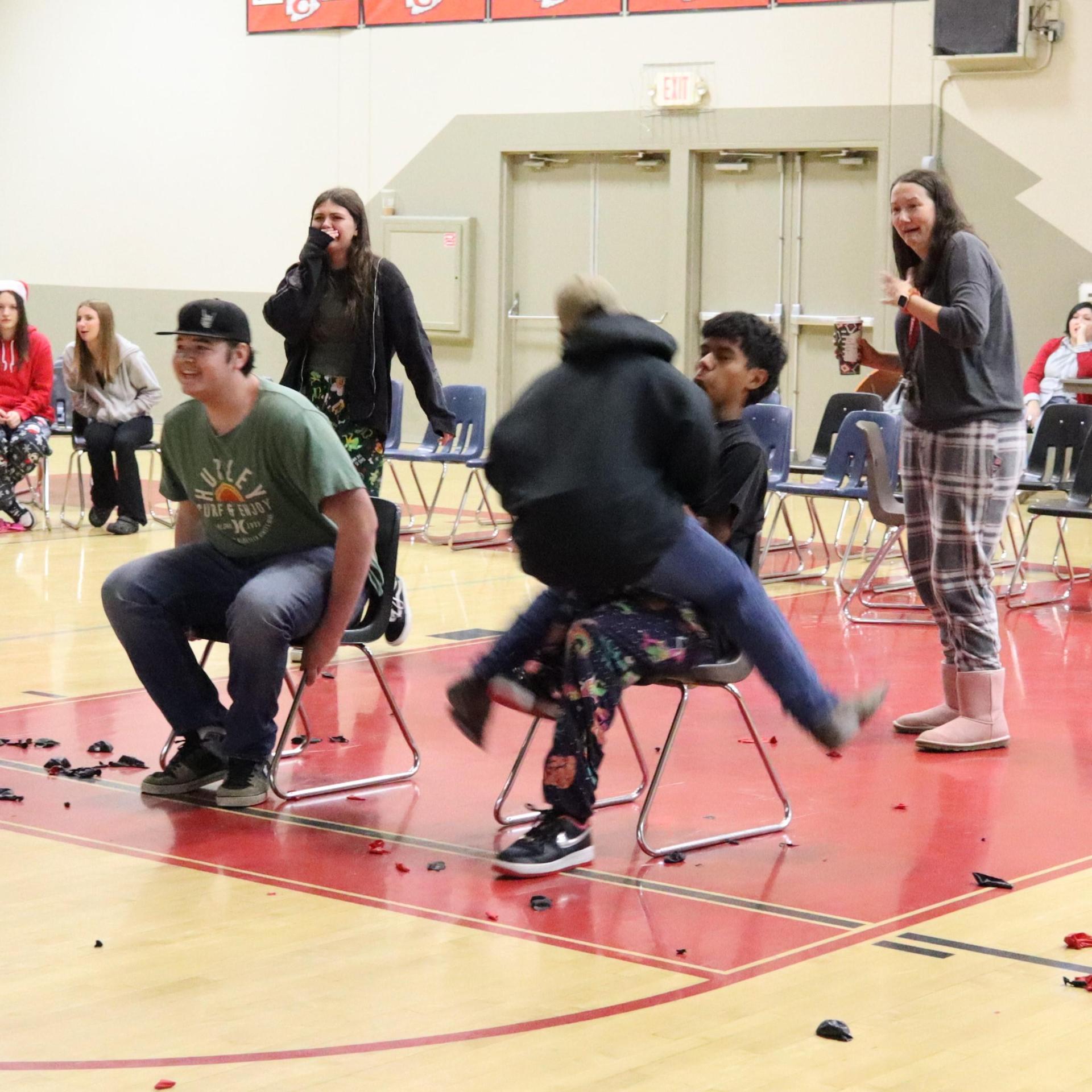 students playing the balloon pop game