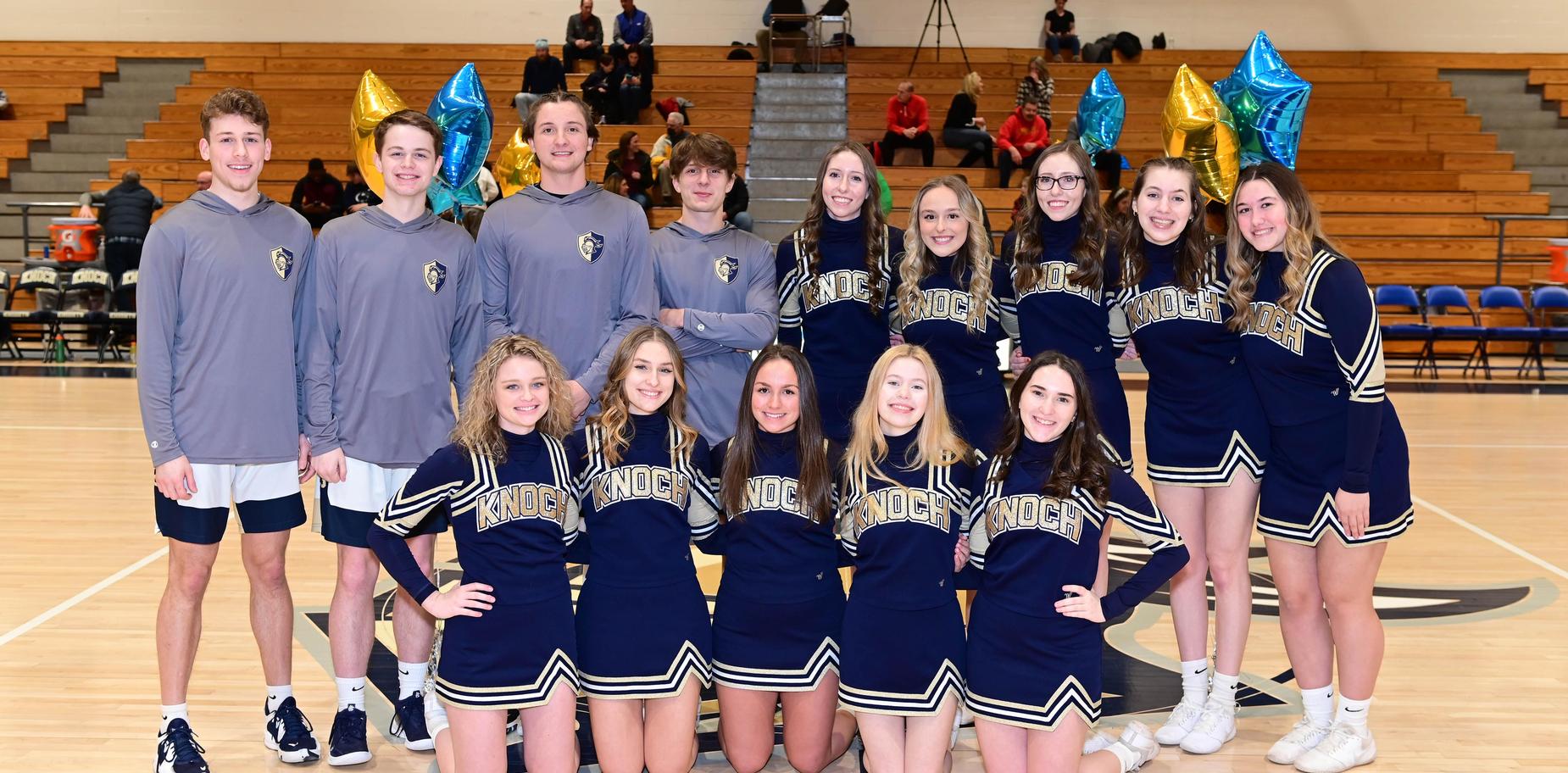 Senior Basketball players and cheerleaders before game