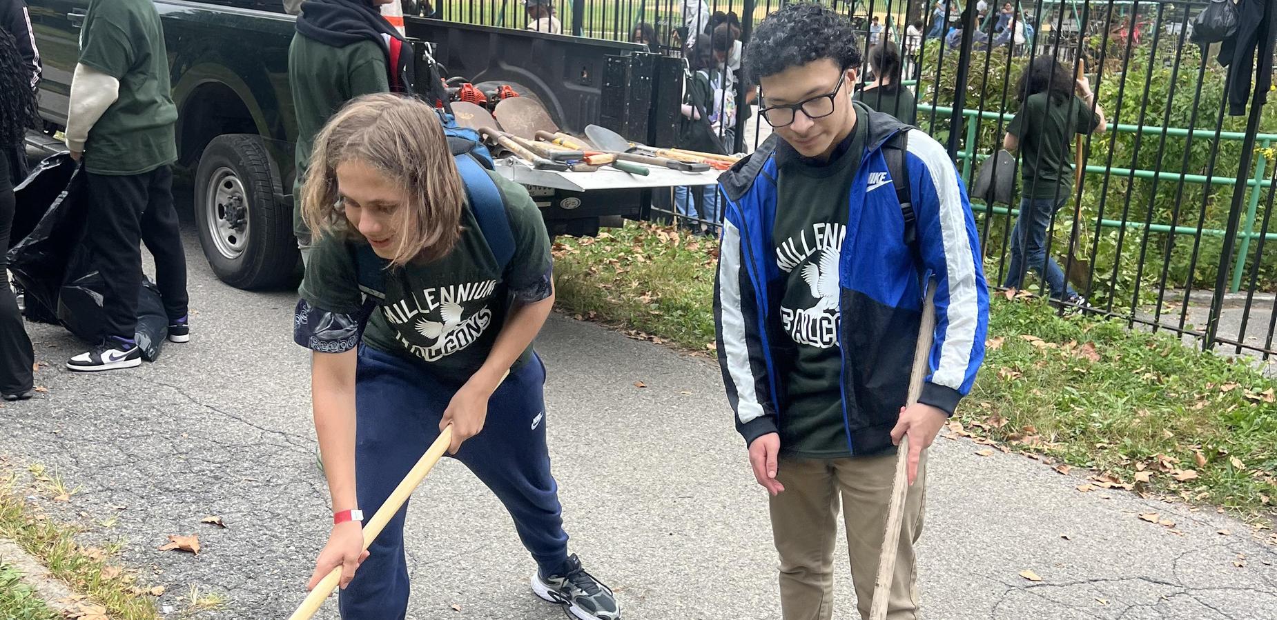 Students cleaning up Pelham Bay Park for community service day.